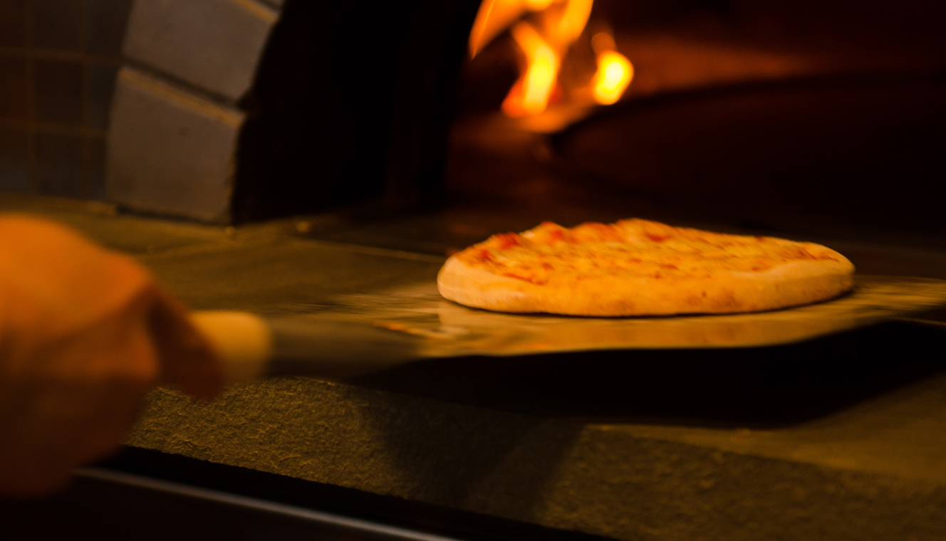 Pizza Going into Oven